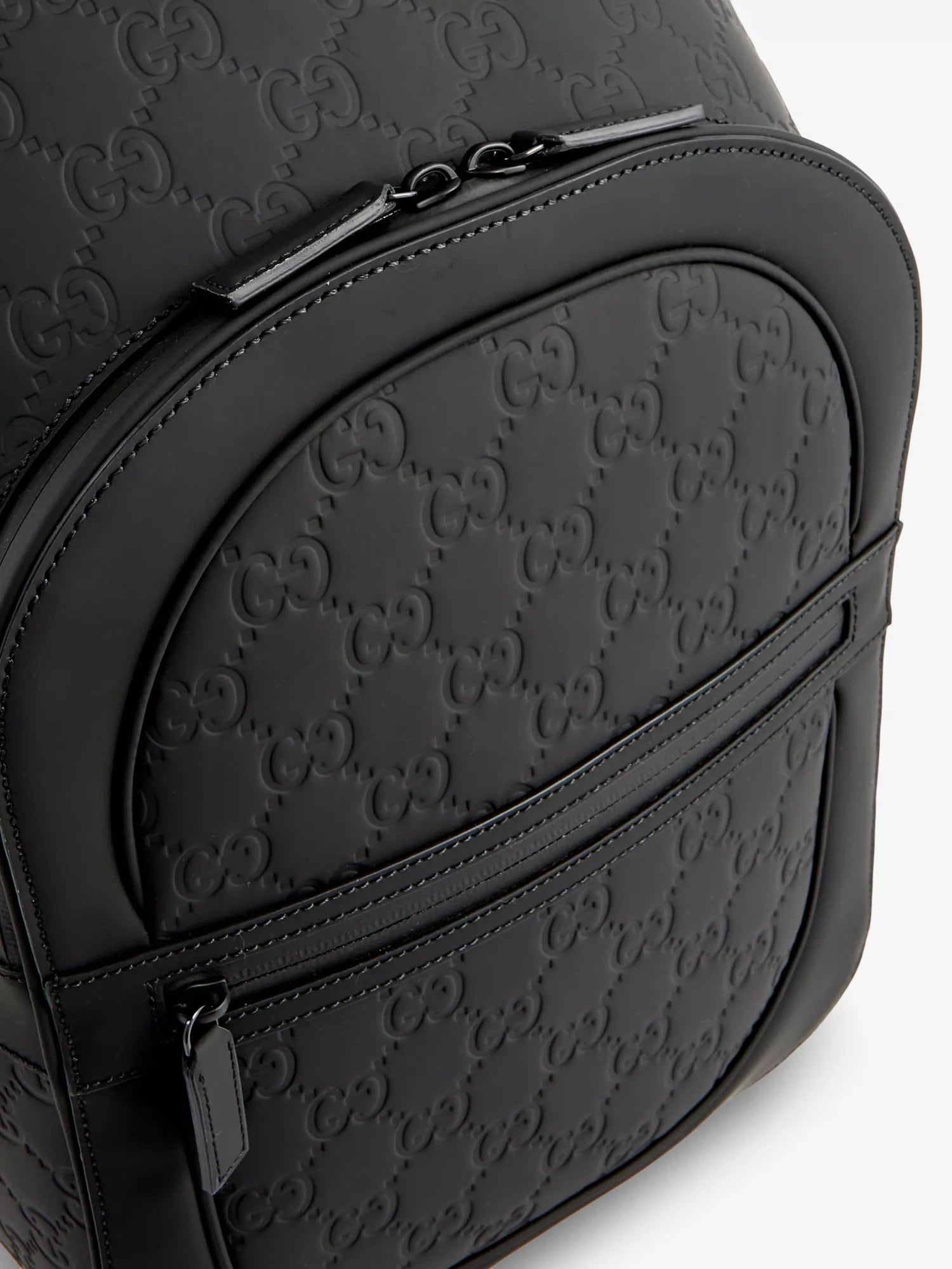 GG logo-debossed leather backpack